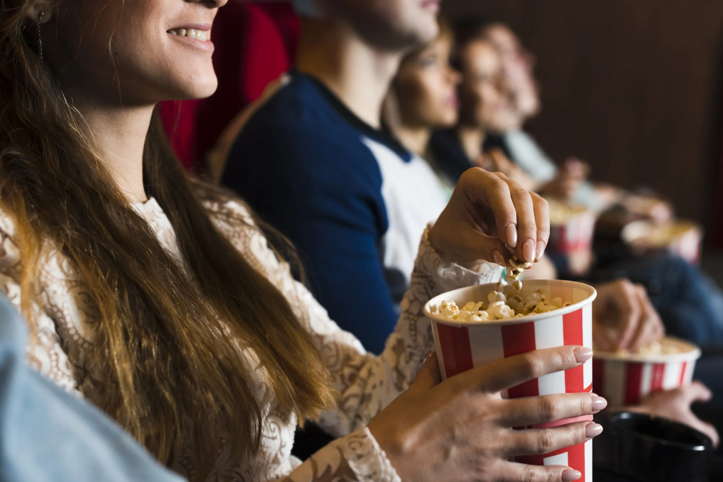 group-young-people-cinema-2560
